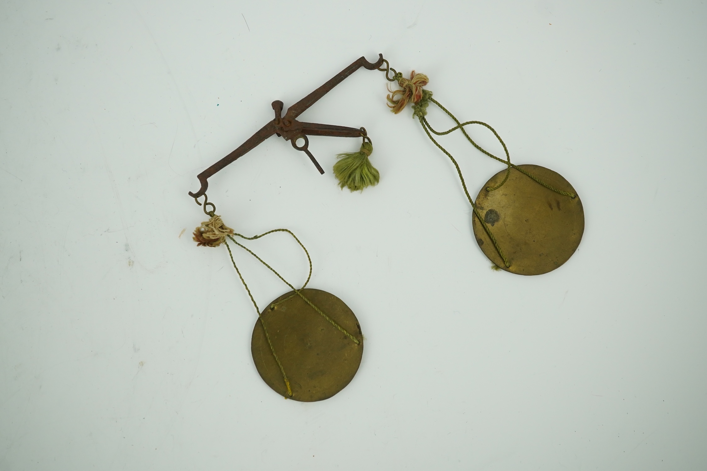 A cased set of late 17th century gold scales labelled for 'James Tallman, At the Sign of the Porridge Pot, on London Bridge, London, all sorts of Scales Weights Beams and Stillerds [sic] and Gold Scales', in original woo